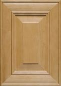 A close up of a wooden cabinet door with a square frame.