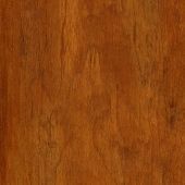 A close up of a piece of wood showing the grain and texture.