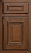 A close up of a wooden cabinet door with drawers.