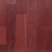 A close up of a red wooden floor.