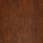 A close up of a piece of brown wood.