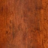 A close up of a piece of wood showing the texture of the wood.