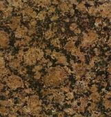 A close up of a brown granite counter top.