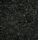 A close up of a black granite counter top.