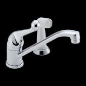 A kitchen sink faucet with a sprayer attached to it on a black background.