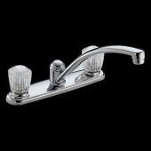 A kitchen sink faucet with clear handles on a black background.