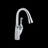A chrome kitchen faucet with a pull out sprayer on a black background.