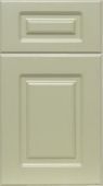 A close up of a white cabinet door on a white background.