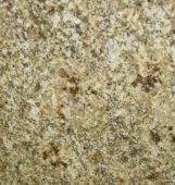 A close up of a brown granite counter top.