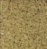 A close up of a yellow granite counter top.