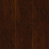 A close up of a piece of dark wood.