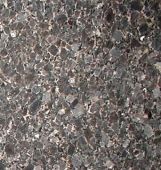A close up of a black granite counter top.