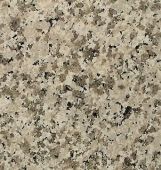 A close up of a granite counter top with a camouflage pattern.