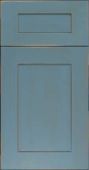 A close up of a blue cabinet door.