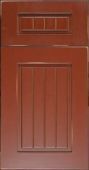 A close up of a red wooden cabinet door.