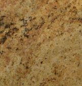 A close up of a yellow granite counter top.