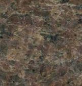 A close up of a brown granite counter top.