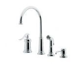 A close up of a kitchen sink faucet on a white background.