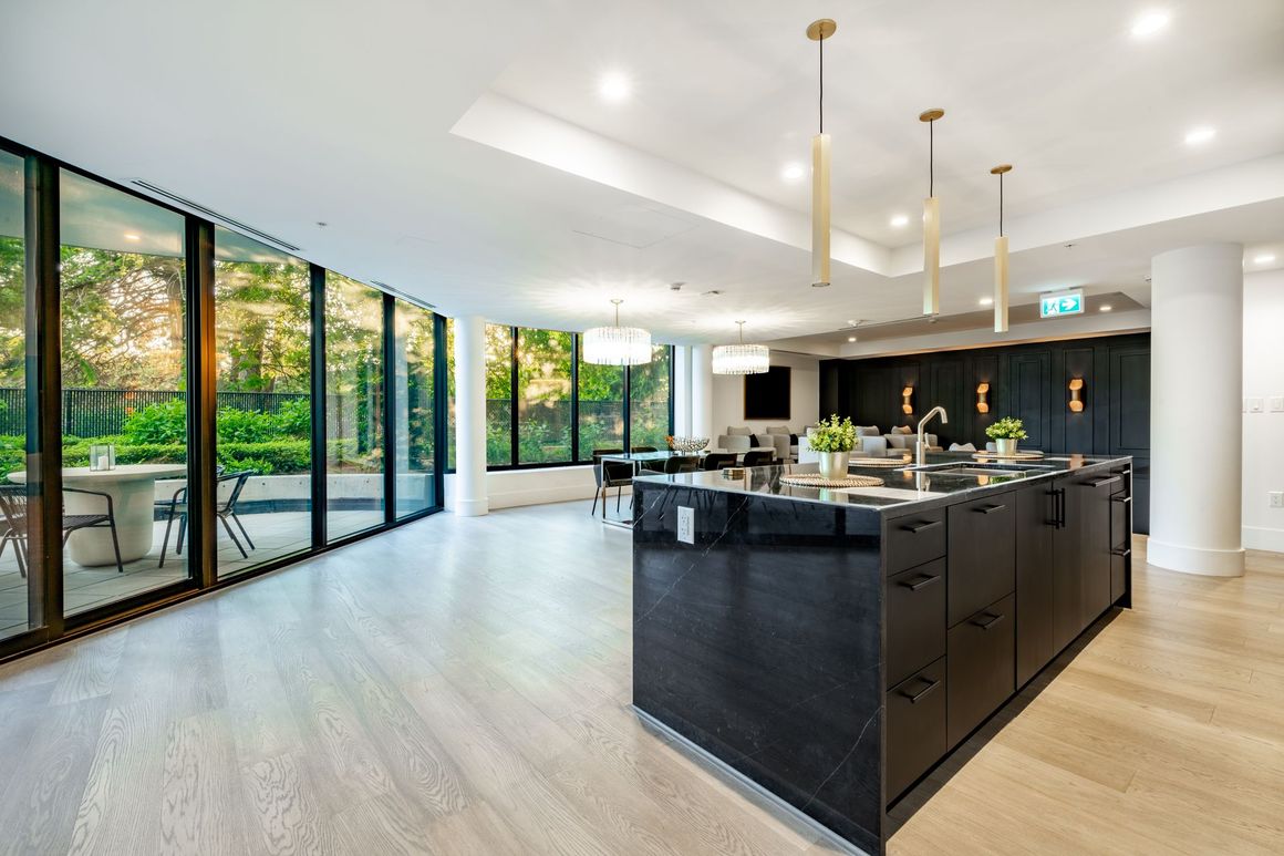 There is a large island in the middle of the kitchen.