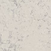 A close up of a white granite counter top.