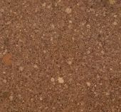 A close up of a brown marble texture with white spots.
