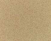 A close up of a piece of cardboard with a grainy texture.