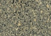 A close up of a granite counter top with a lot of small stones on it.