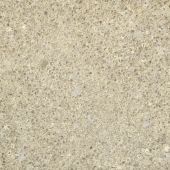 A close up of a beige granite counter top.