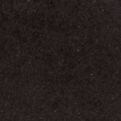 A close up of a black surface with a grainy texture.