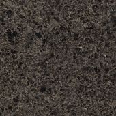 A close up of a black granite counter top.