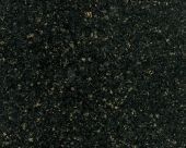 A close up of a black granite counter top.