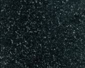 A close up of a black granite counter top.