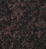 A close up of a brown granite counter top.