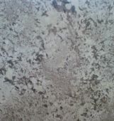 A close up of a gray and white marble texture.