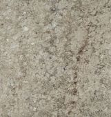 A close up of a gray granite counter top.