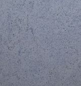 A close up of a gray concrete surface.
