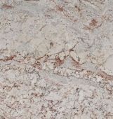 A close up of a white granite counter top.