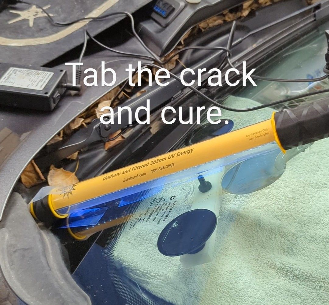 Tab and curing a crack