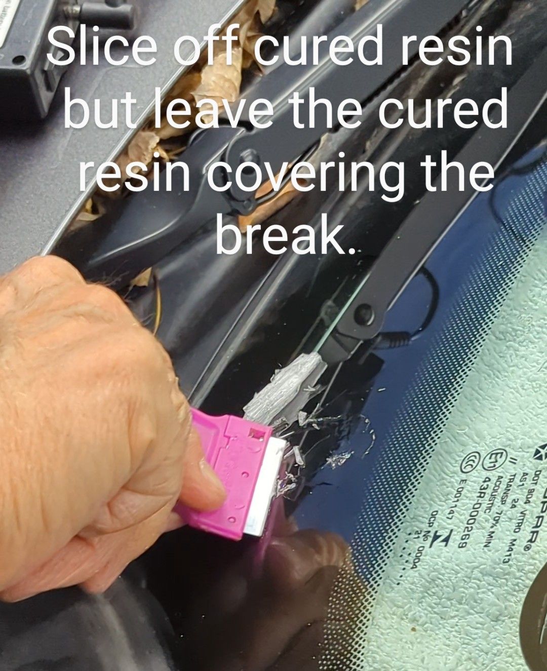 slice the cured resin off of the repaired crack
