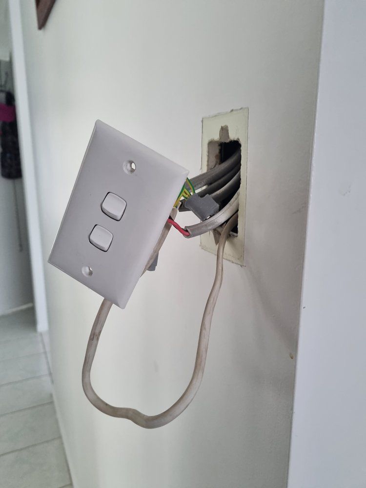 Installing Light Switch — Electricians In Bundaberg, QLD