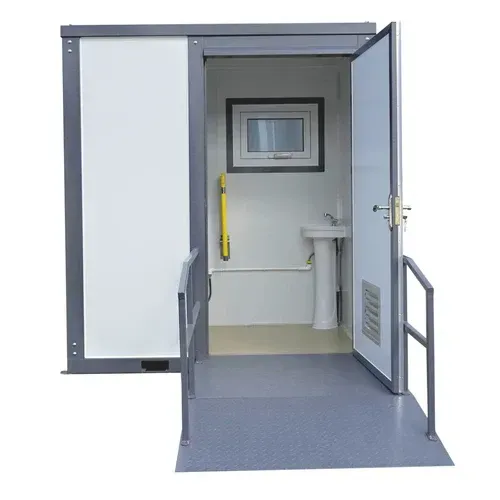 Accessible portable restroom with ramp, sink, and grab bar. Gray, white, and yellow.