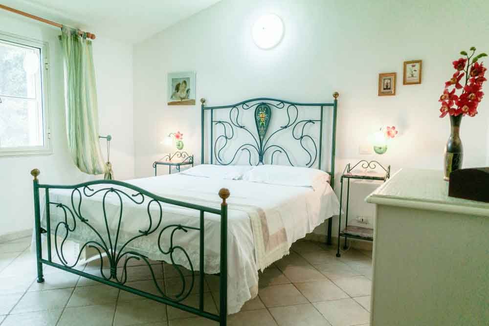 Casa Santu Juanne double bed with iron frame