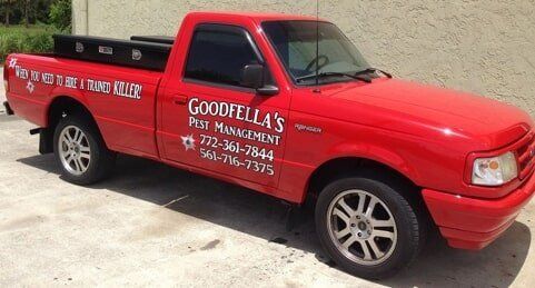 Red Exterminator Truck — Port St. Lucie, FL — Goodfella's Pest Management Inc