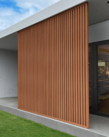 A house with a wooden wall and a large window.