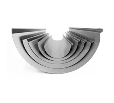 A close up of a gray gutter on a white background.
