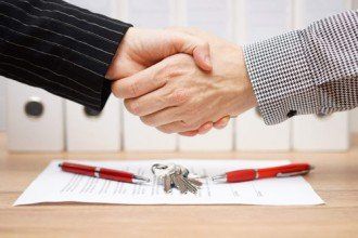 Client and Agent are Handshaking - Estate Planning in Chicago, IL
