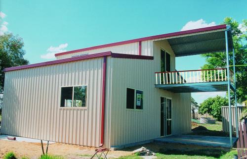 Large Shed With Red Metal Roof — About Us in Coffs Harbour, NSW