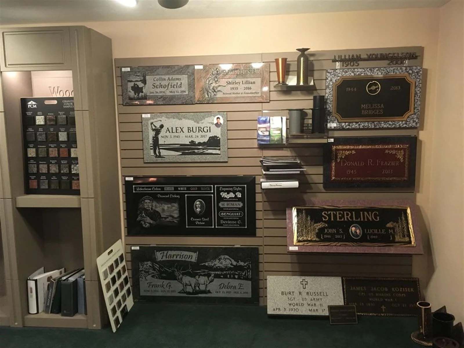 A wall of plaques including one that says sterling