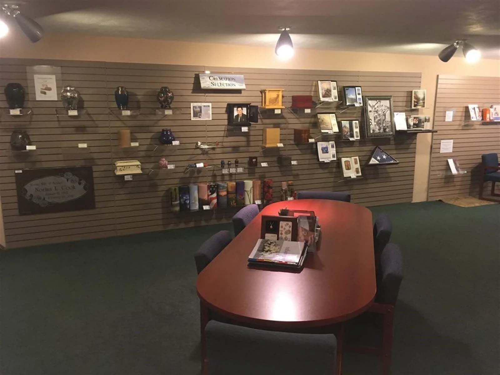 A room with a table and chairs in it