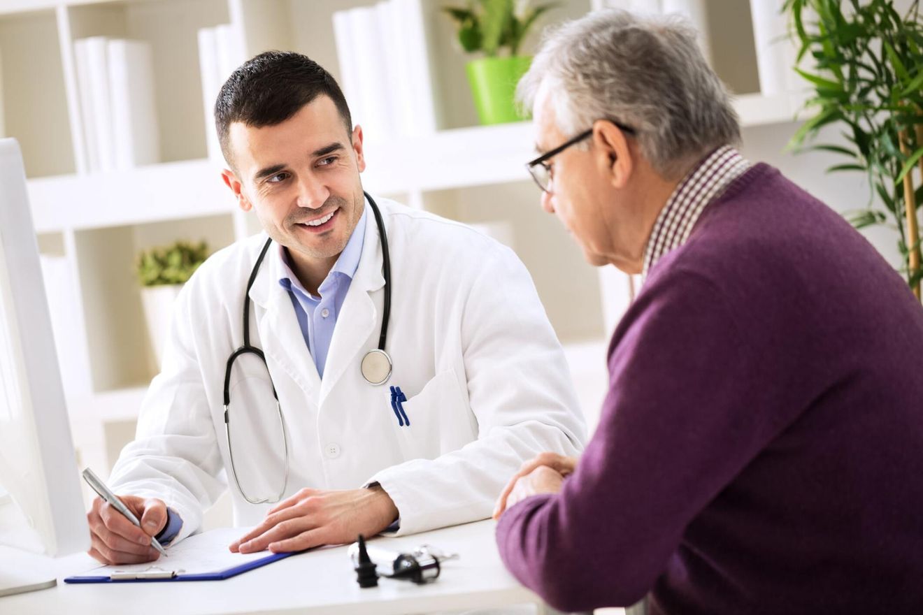 Doctor Consulting the man - Family Medicine in Greenville, NC